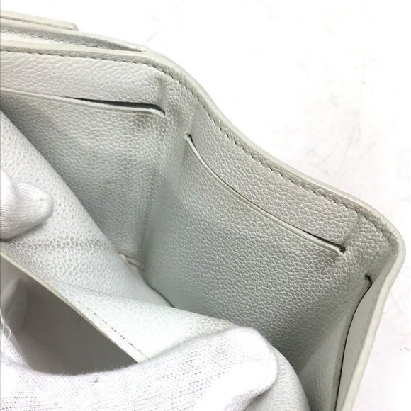 LOUIS VUITTON Portefeuille lock mini Compact Wallet Trifold Leather - Picture 3 of 14